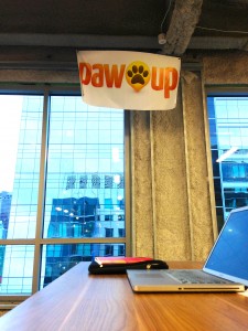 PawUp's sign at the MassChallenge in the innovation district