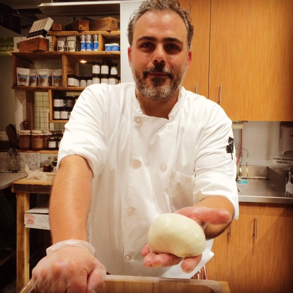 Luca Mignogna, artisanal cheesemaker, of Wolf Meadow Farm at the Boston Public Market. Photo credit: Cristiano Bonino